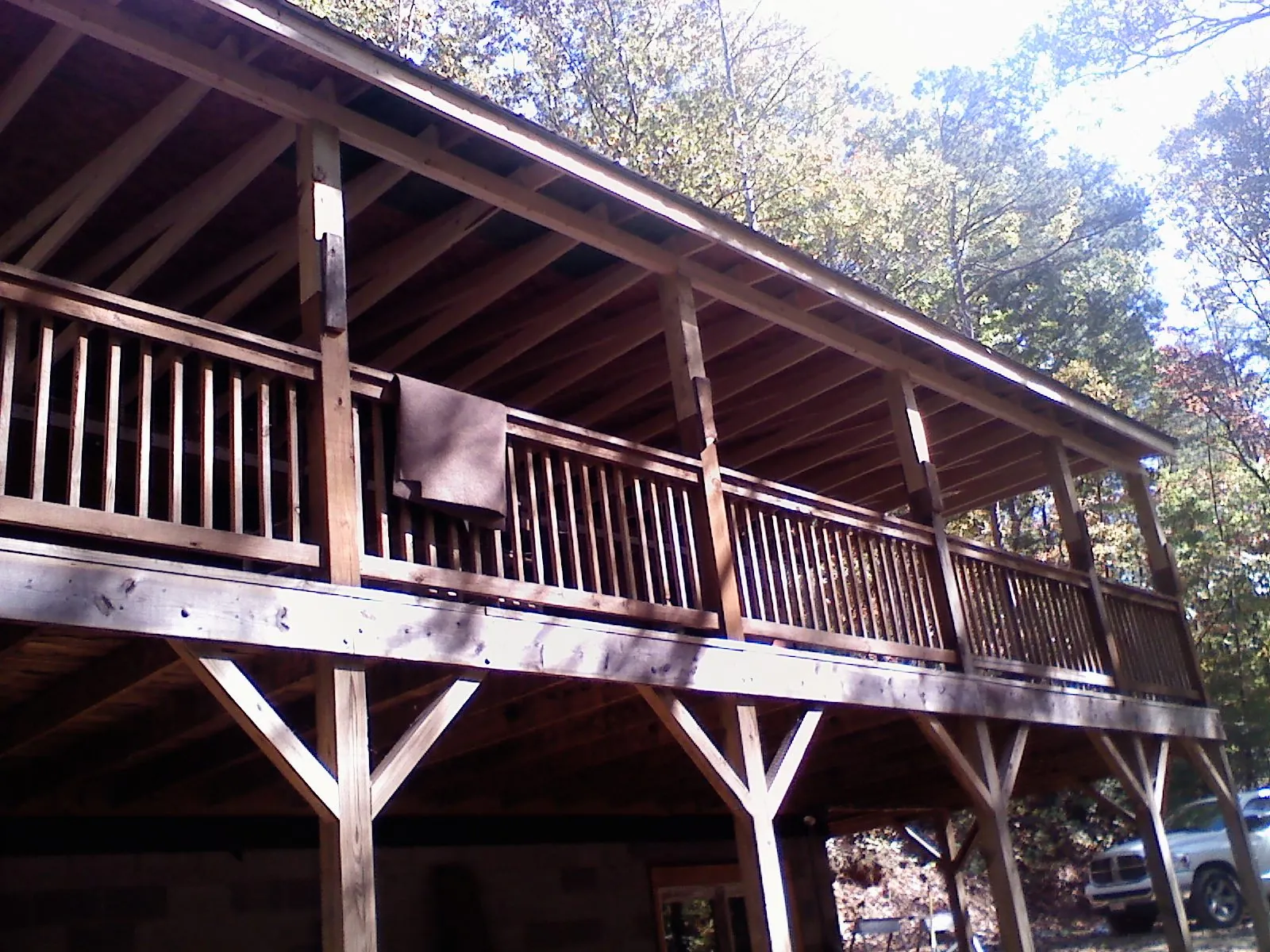 Timber framing under a new elevated porch and deck — Roof Leak Repair in Oakville by Roofing Brothers